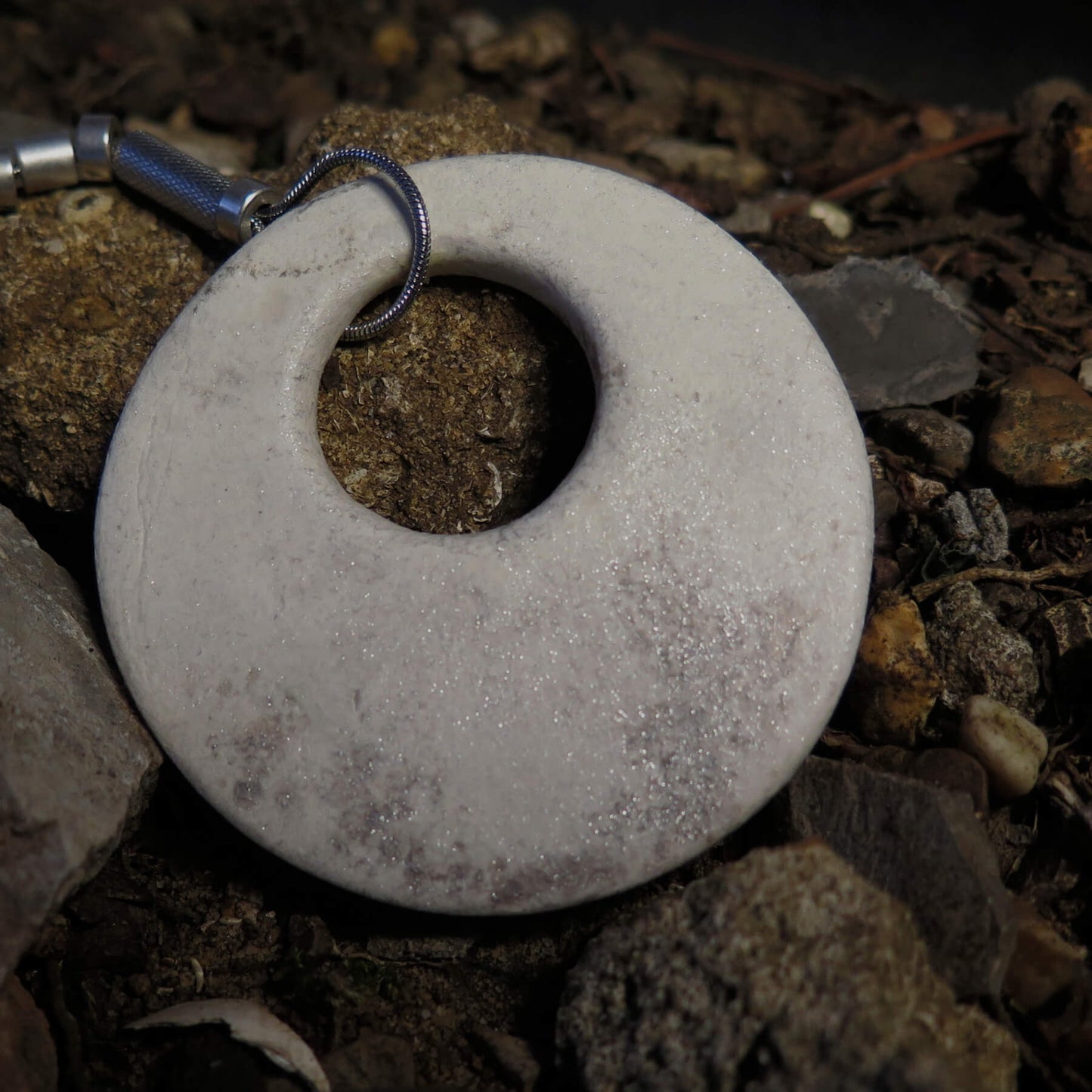 Eclipse stone with silver dust on adjustable length silver snake chain necklace with bar pendant ends