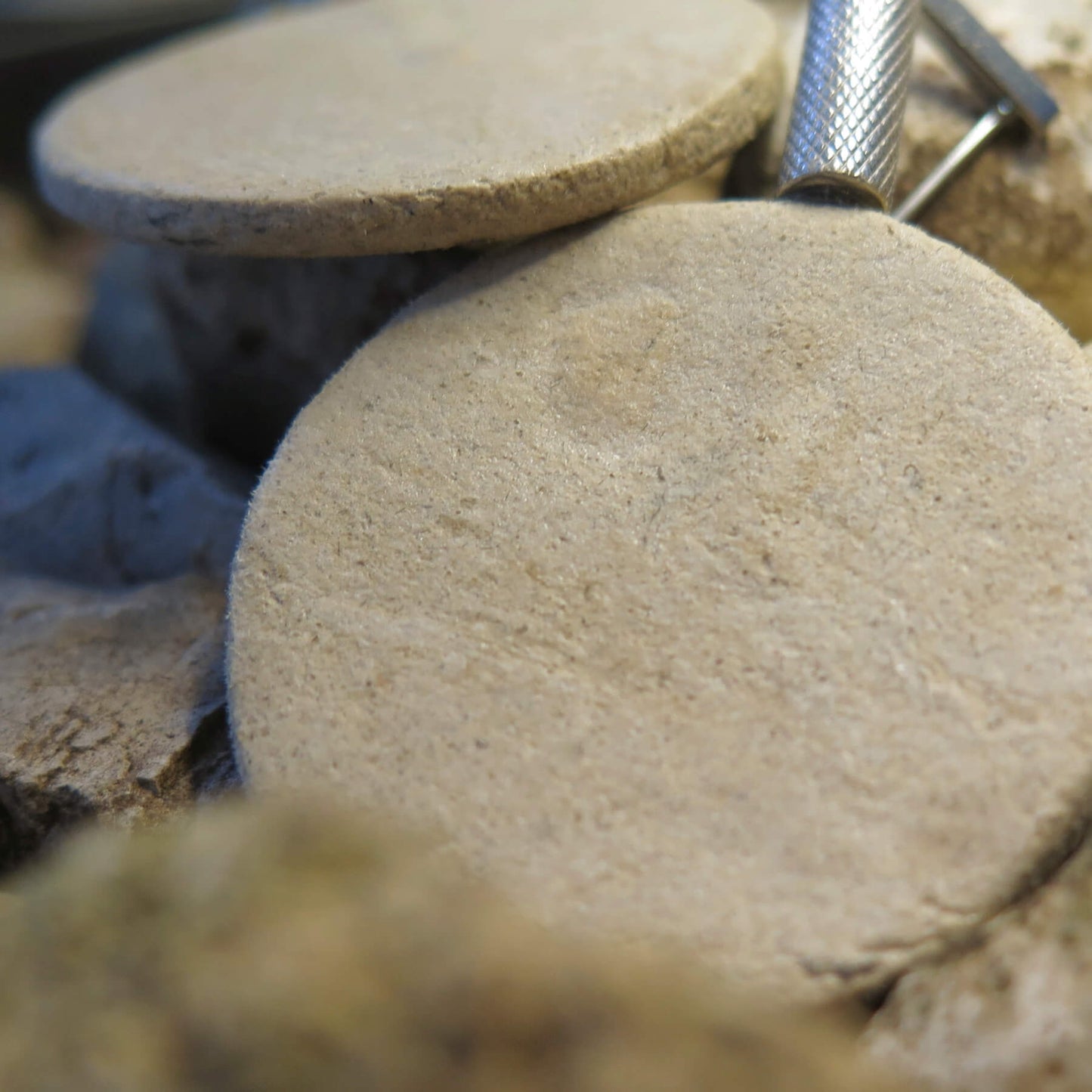 Natural stone small coin earrings with silver flute