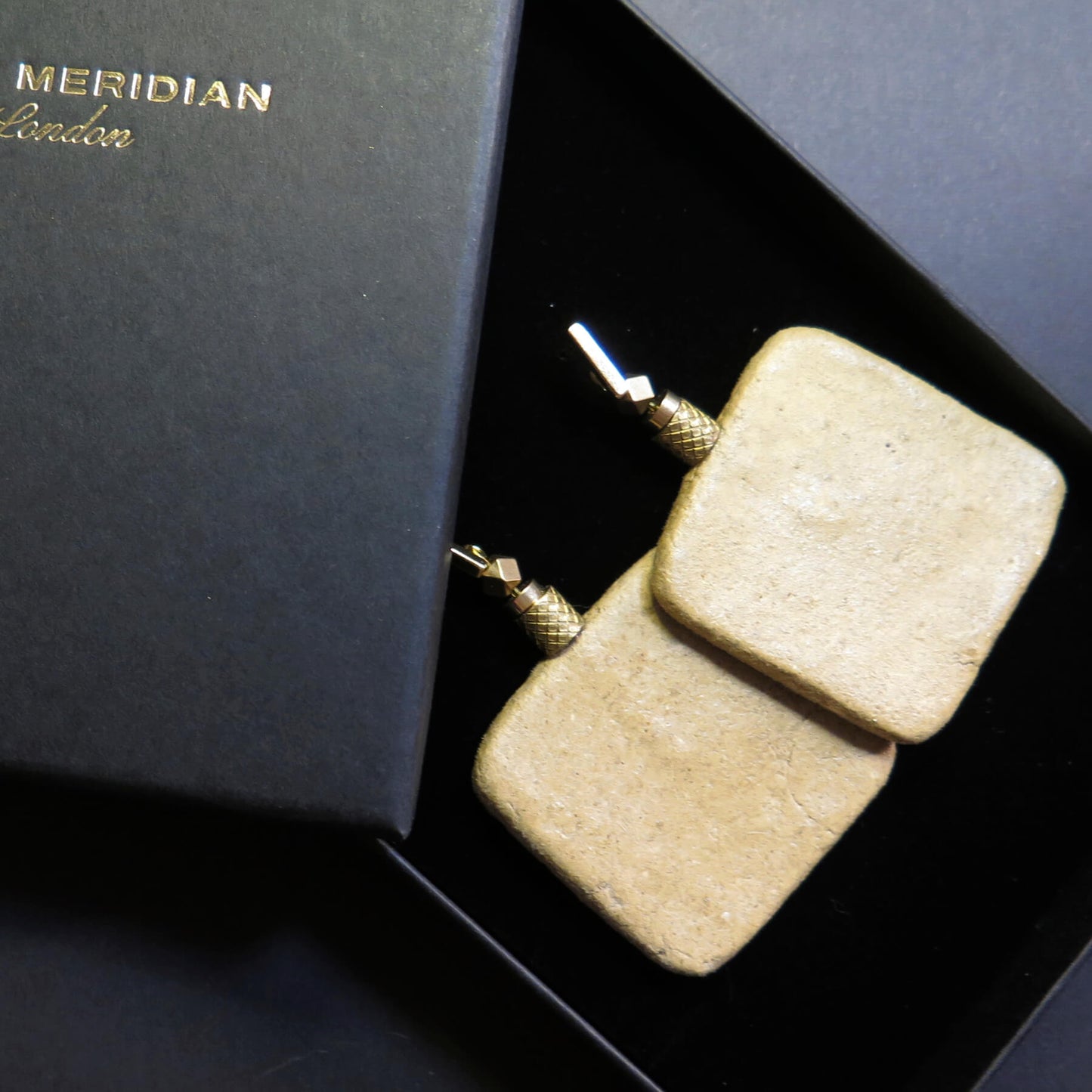 Natural stone slab earrings with brass pineapple detailing
