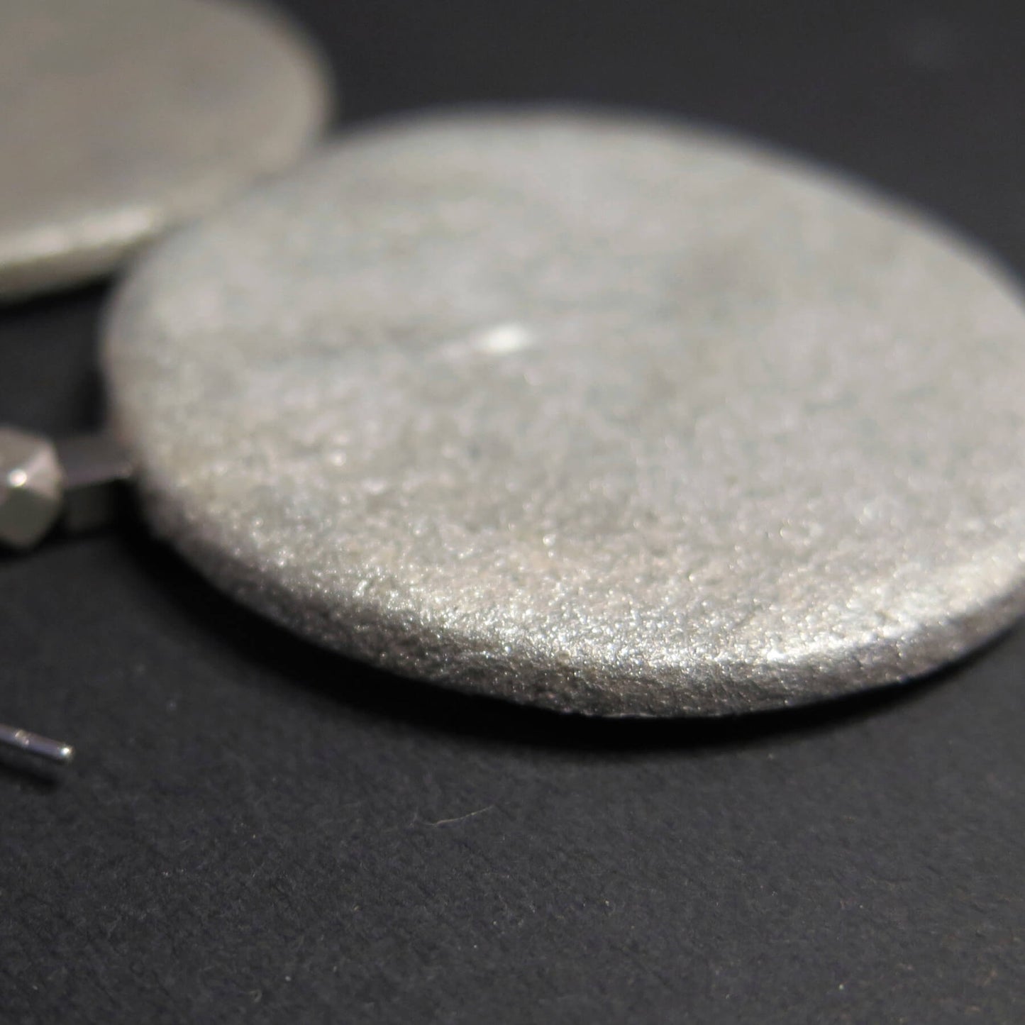 Silver stone large coin earrings with detailing
