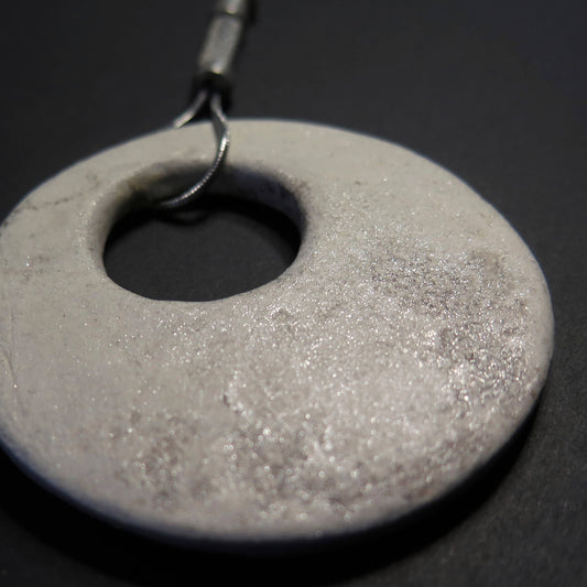 Eclipse stone with silver dust on adjustable length silver snake chain necklace with bar pendant ends