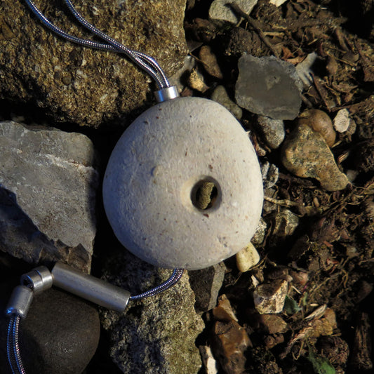 Sculpted light grey pebble on adjustable length silver snake chain necklace with bar pendant ends