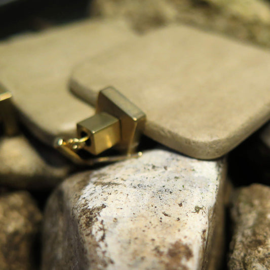 Natural stone slab earrings with brass cubes